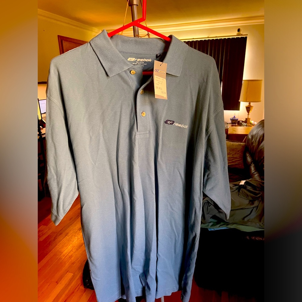 Net men’s Reebok slate blue polo
